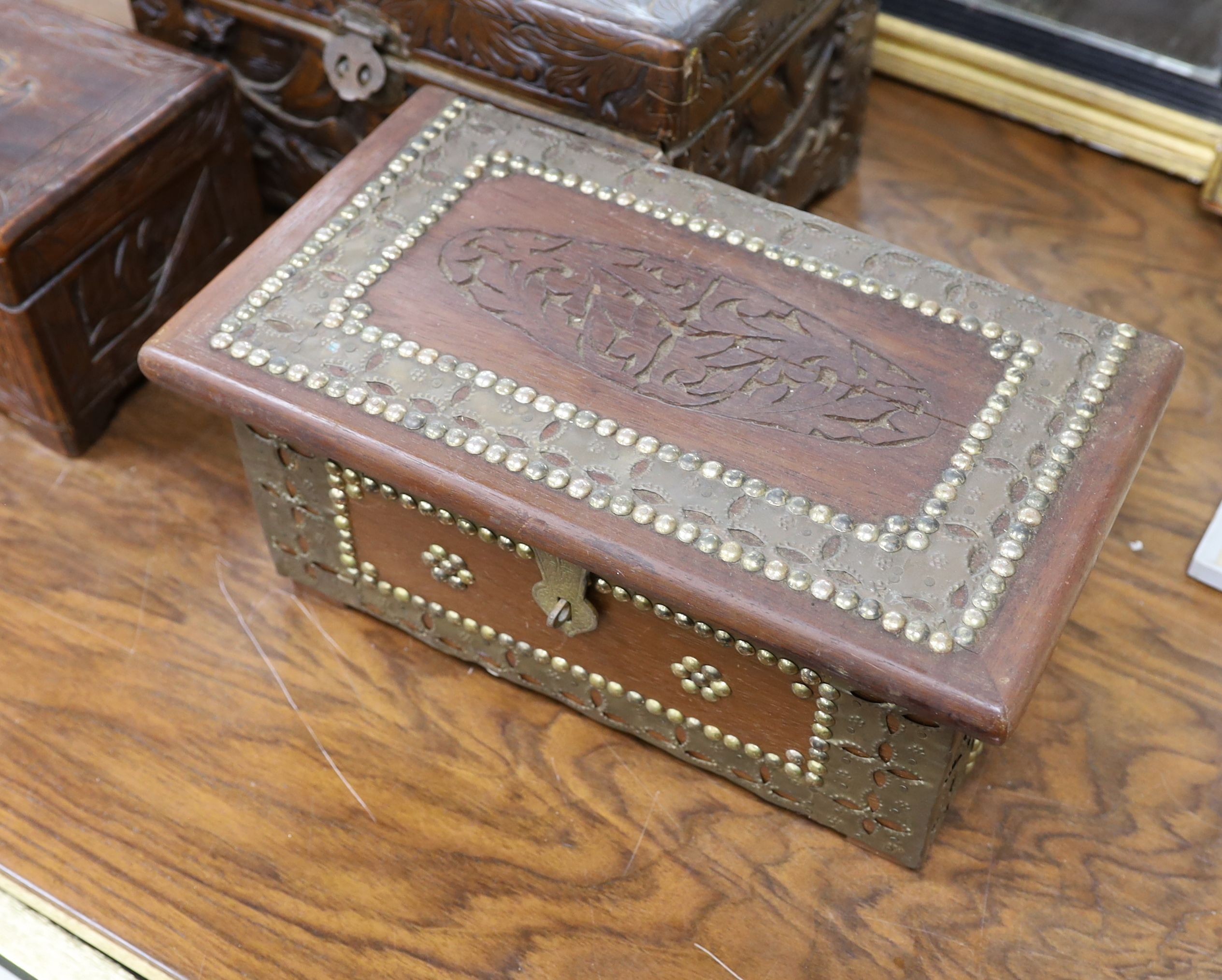 A Chinese carved camhor wood chest and three assorted boxes, Camphor chest 35 cms wide x22 cms high.